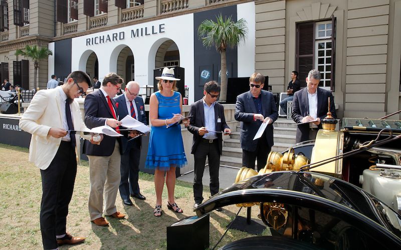 Iain Tyrrell with fellow judges at Concours d'Elegance in 2013.