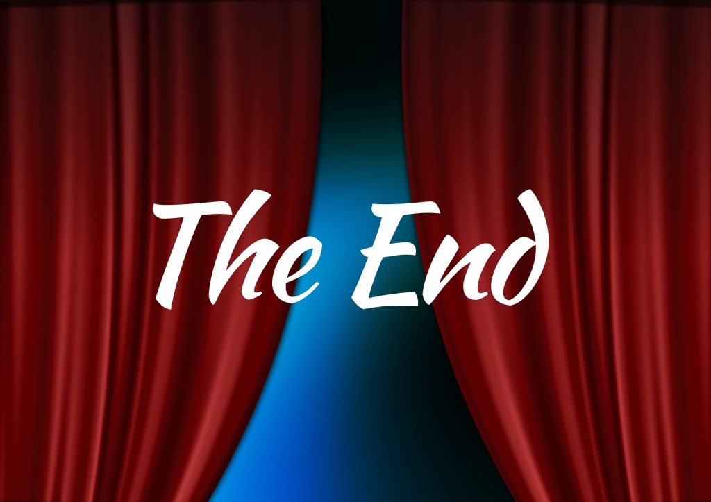 Background of a red closing curtain with white text "The End" in front.